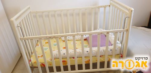 מיטת תינוק למסירה מחדרה