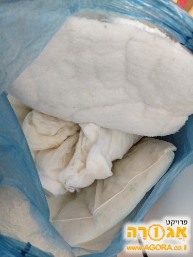 ריפוד של כריות לטובת מלאכת יד כלשהי