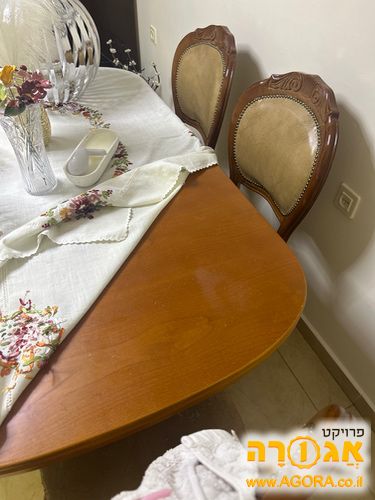 פינת אוכל עם שש כיסאות מעץ נפתח ל3 מטר