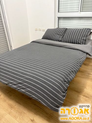 מיטה וחצי מתכווננת עם ארגז מצעים