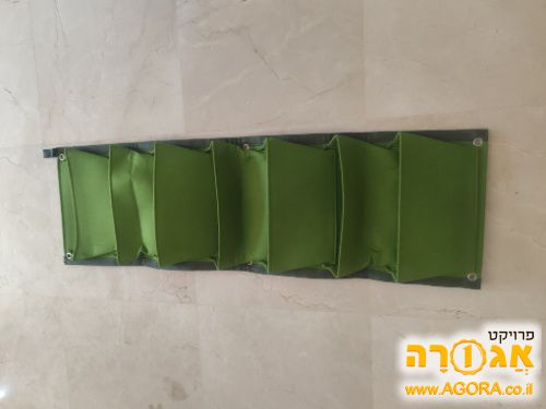 מתקן לתליית צמחים במרפסת