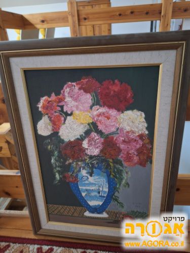 ציור ממוסגר של כד פרחים
