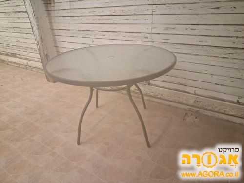 שולחן עגול זכוכית לחצר