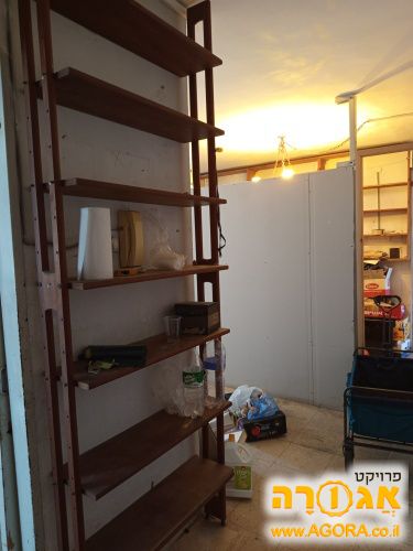 מדפי ספרים מעץ טיק