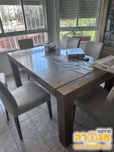 שולחן אוכל נפתח