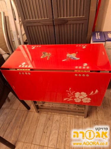 שולחן נפתח מזכוכית
