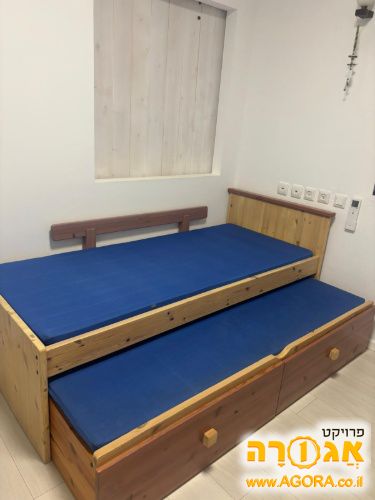 מיטת ילדים כוללת מיטת חבר, אחסון ומעקה