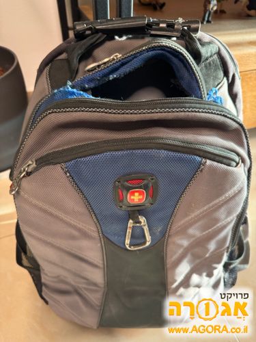 תיק לפטופ סוויס במצב טוב למעט חור