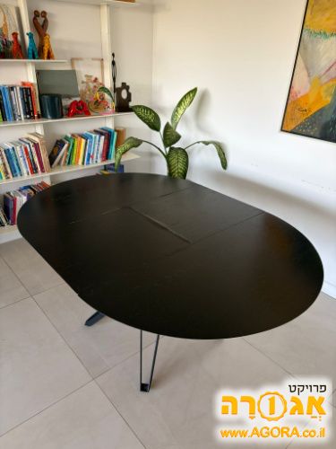שולחן אוכל נפתח