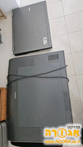 מחשב נייד דל ולוח וואקום לציור