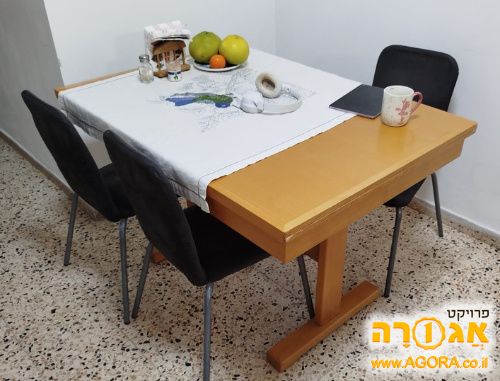 שולחן אוכל נפתח