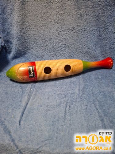 מסרק לליווי במוסיקה בתופים