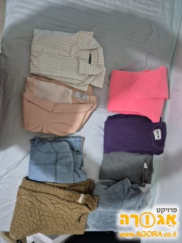 בגדים מידה 14-16 בעיקר עליונית