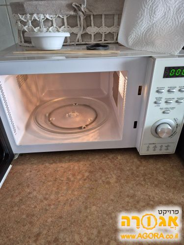מיקרוגל מחיפה עובד מצויין עם קילוף בצד ש