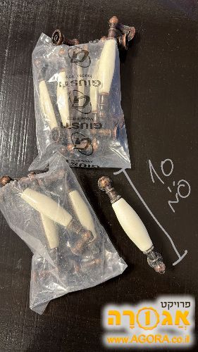 ידיות לארונות בצבע נחושת ושמנת