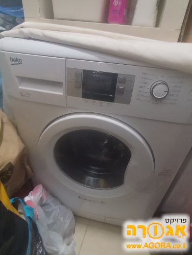 מכונת כביסה בקו