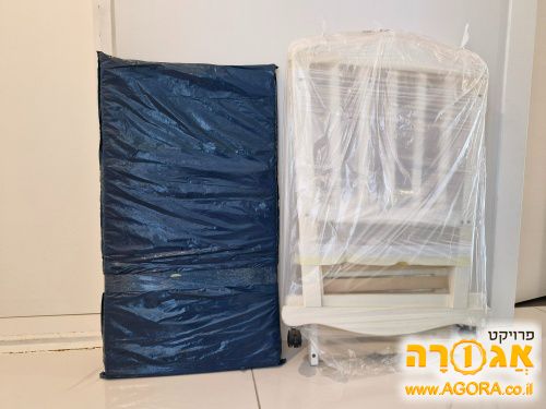 עריסת תינוק.ת מעץ