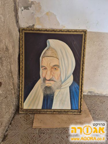 תמונה גדולה של הצדיק מחיפה ליד הים