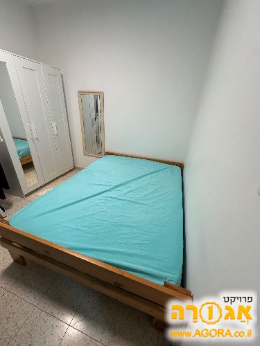 מיטה זוגית מעץ עם מזרון