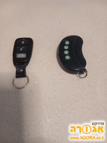 שלטים לשער חניה חשמלי