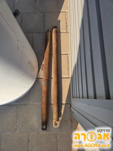 קפיצים לשער חניה