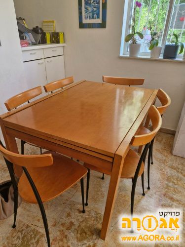 שולחן אוכל נפתח מעץ
