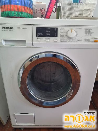 מכונת כביסה miele. בת 6 שנים עובדת. מידו