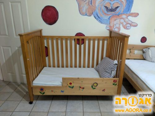 מיטת תינוק ומעבר