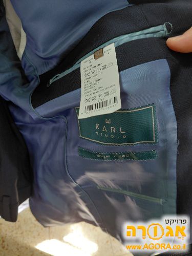 חליפה מידה 48 כולל מכנס מידה 44 .של קרל
