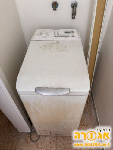 מכונת כביסה פתח עליון Electrolux