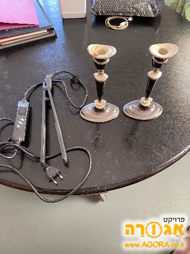 תמותי מתכת ומחליק שיער