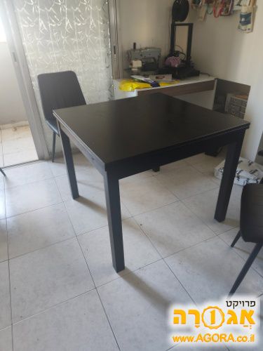 שולחן אוכל נפתח