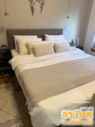 מיטה מתכווננת של עמינח