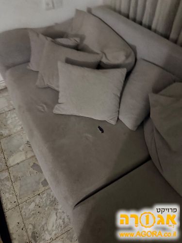 ספה מפנקת עם קרע קטן
